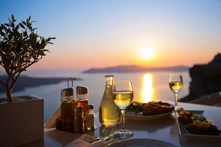 Dinner-for-two-sunset-in-Santorini-luxury-private-tours-of-Greece